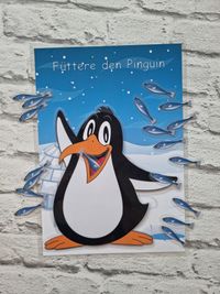 F&uuml;ttere_den_Pinguin